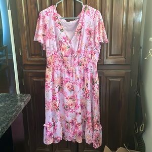 Flowing pink floral dress with butterfly sleeves